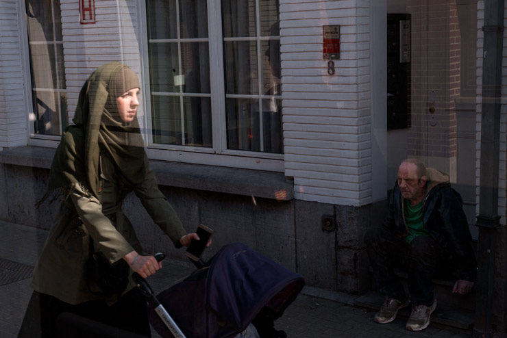 During one and a half year, I travelled with every bus, tram, and metro line at least once, from terminal to terminal.  Images and text show a cross-section of Brussels, while also  giving a brief glimpse into the lives of the) fellow passengers who cross our path every day. © Bram Penninckx